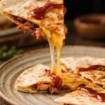 BBQ chicken quesadilla with melted cheese close-up